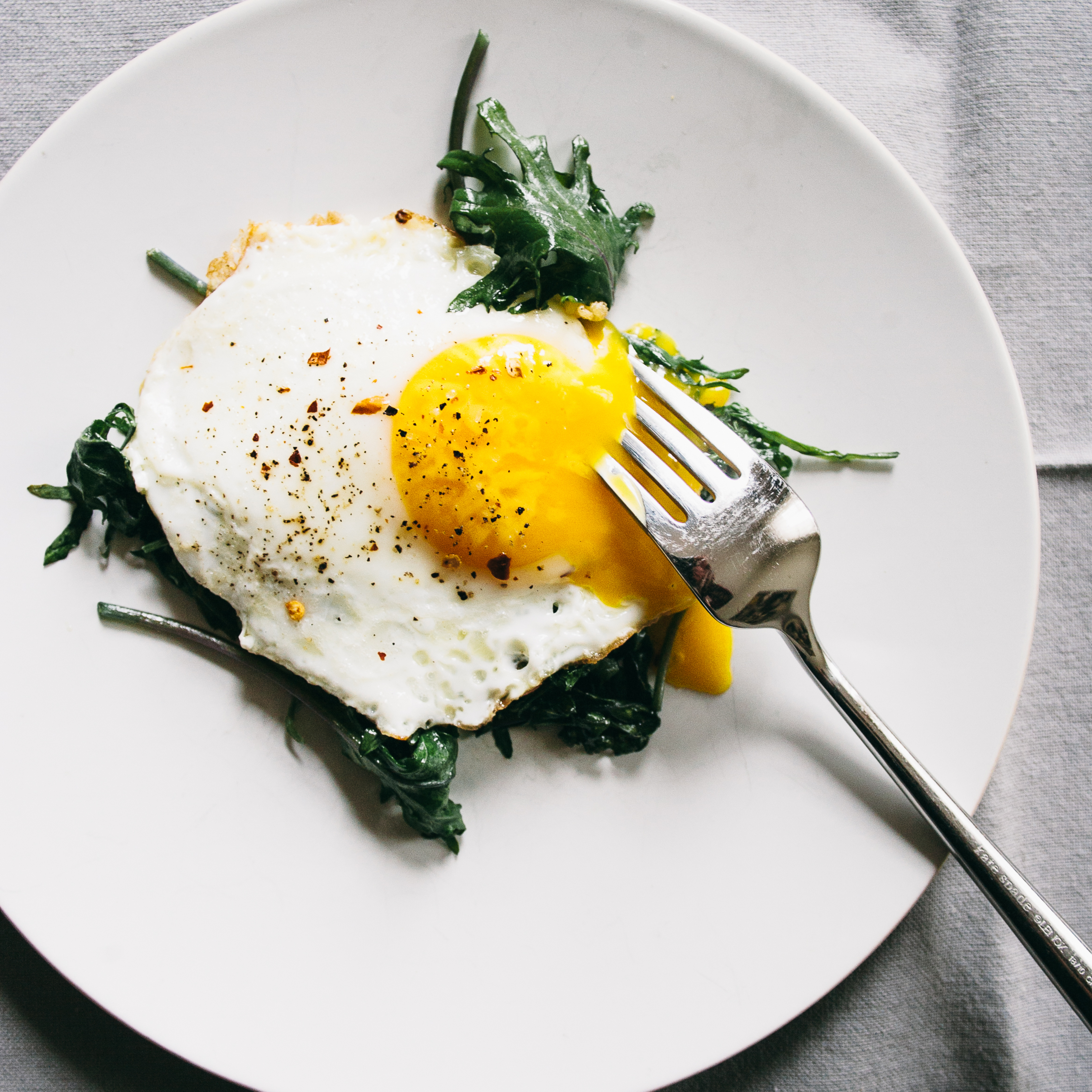 Eggs Over-Easy + Sauteed Baby Kale