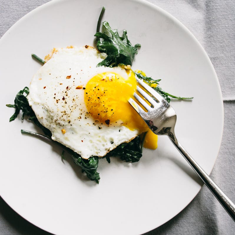 Best Sauteed Baby Kale with Eggs OverEasy Recipe The Yellow Table